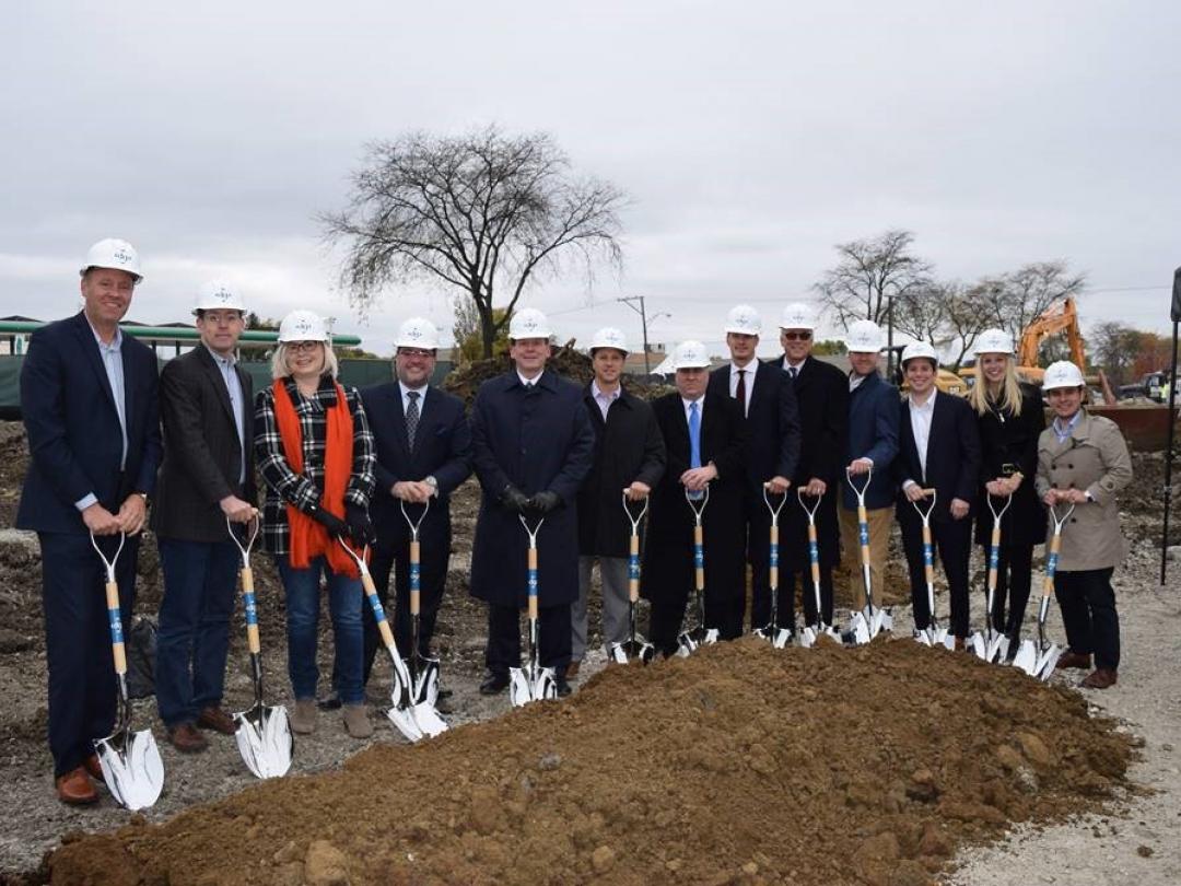 Group of people with shovels at the groundbreaking in Downers Grove